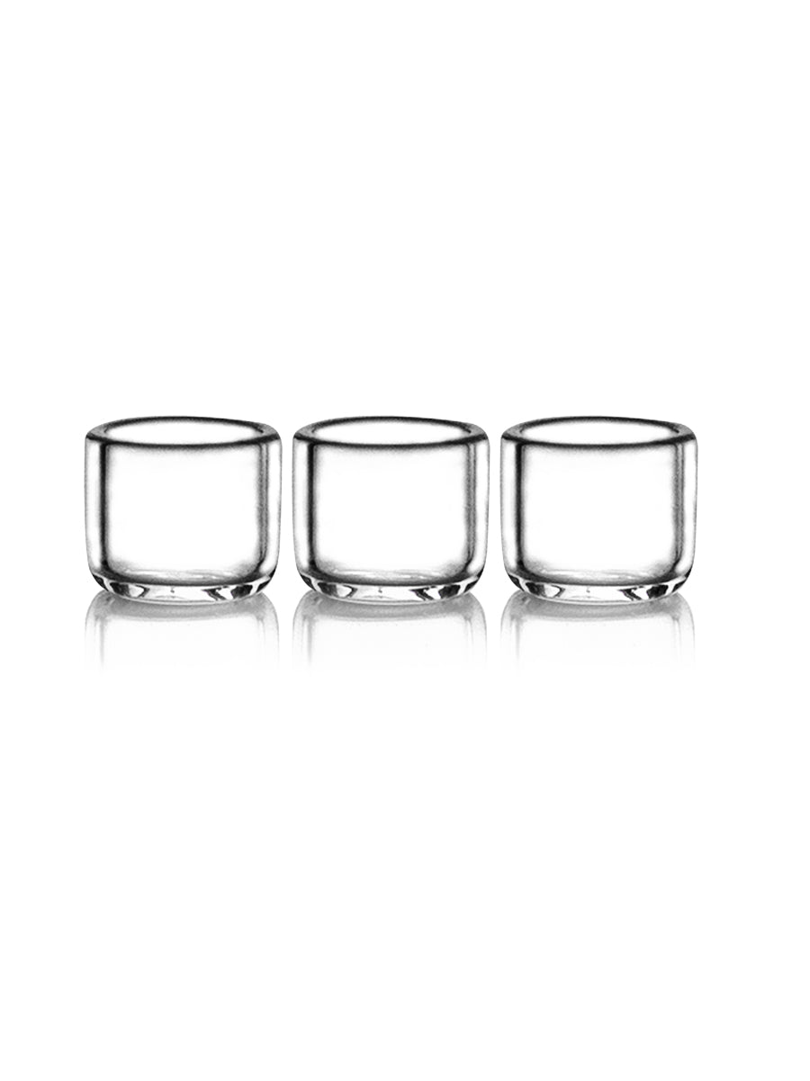 Three clear glass tumblers on a white background